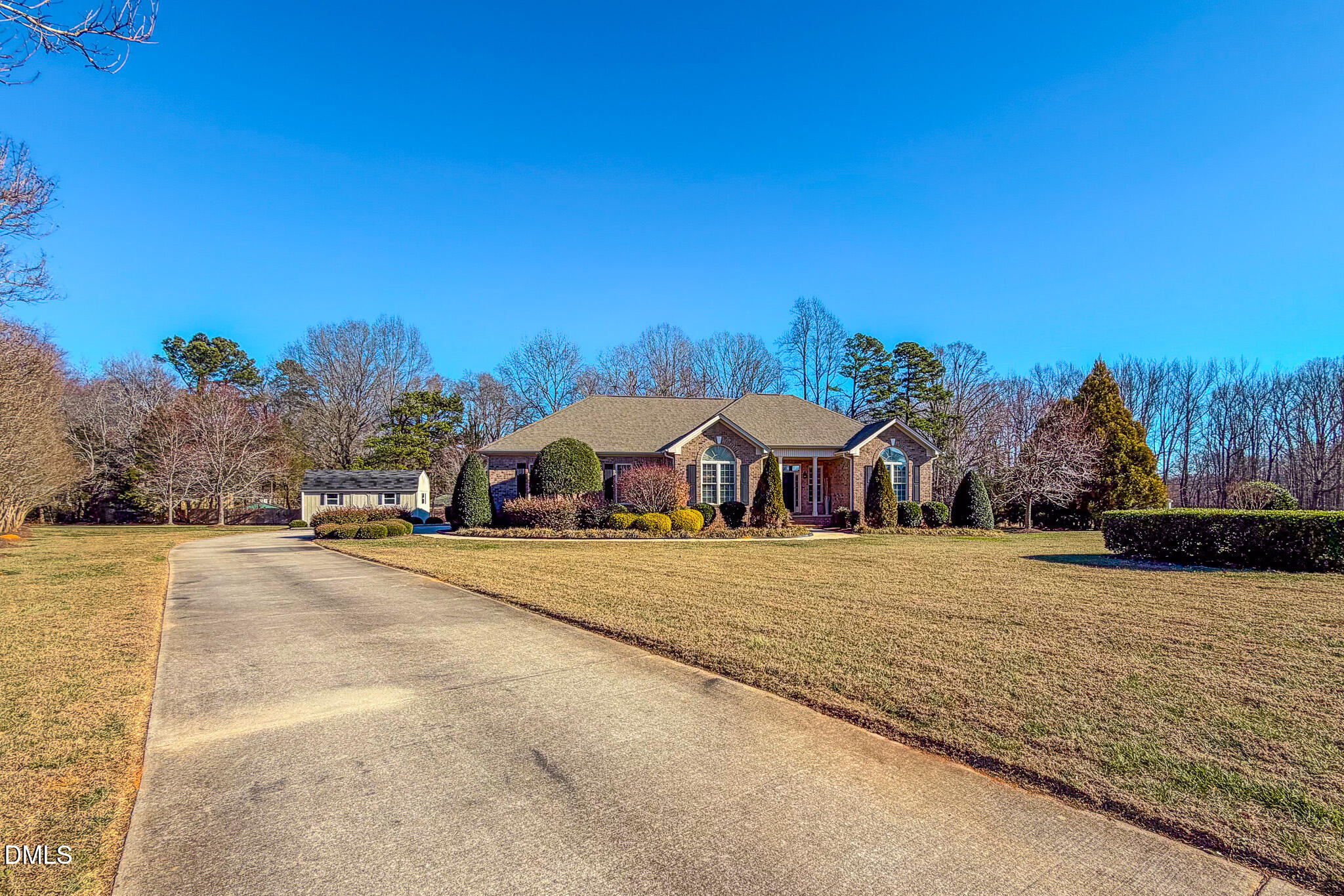 189 Hannah Lane Roxboro, NC 27574 - Photo 35 of 37 a view of an house with backyard and trees
