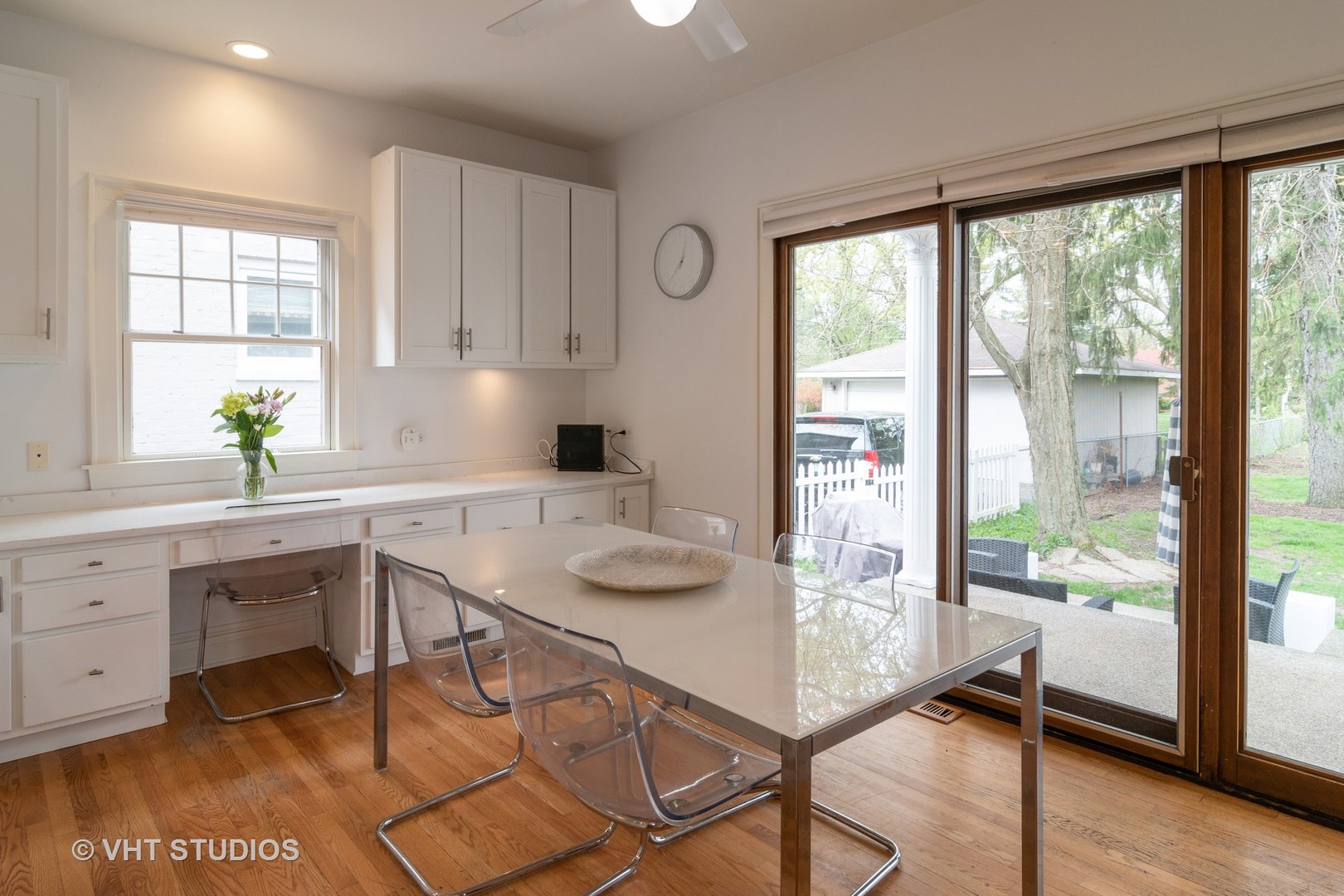 330 Northwood Road Riverside, IL 60546 - Photo 11 of 22 a kitchen with a table chairs sink and cabinets