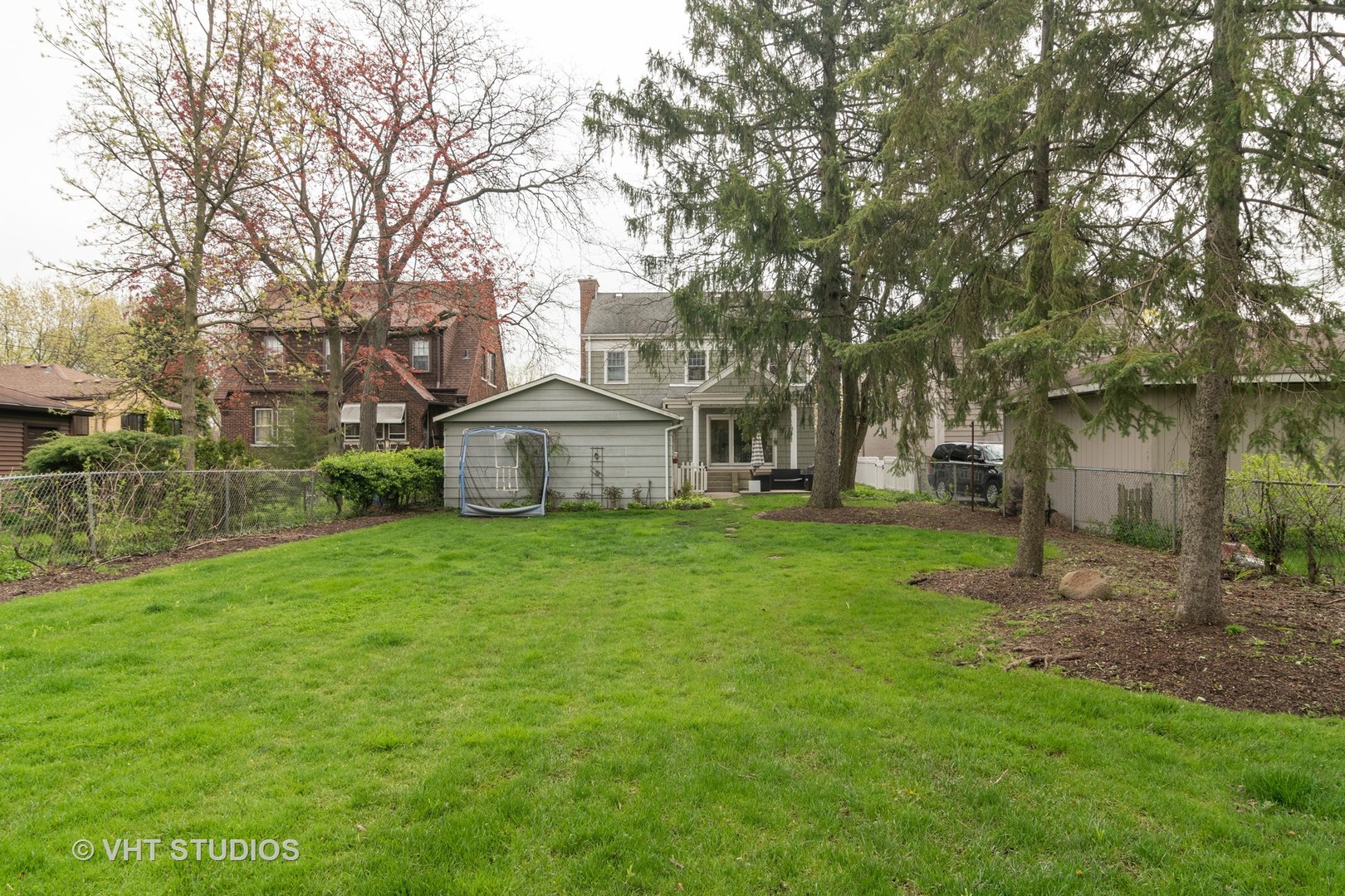 330 Northwood Road Riverside, IL 60546 - Photo 20 of 22 a view of a house with backyard and garden