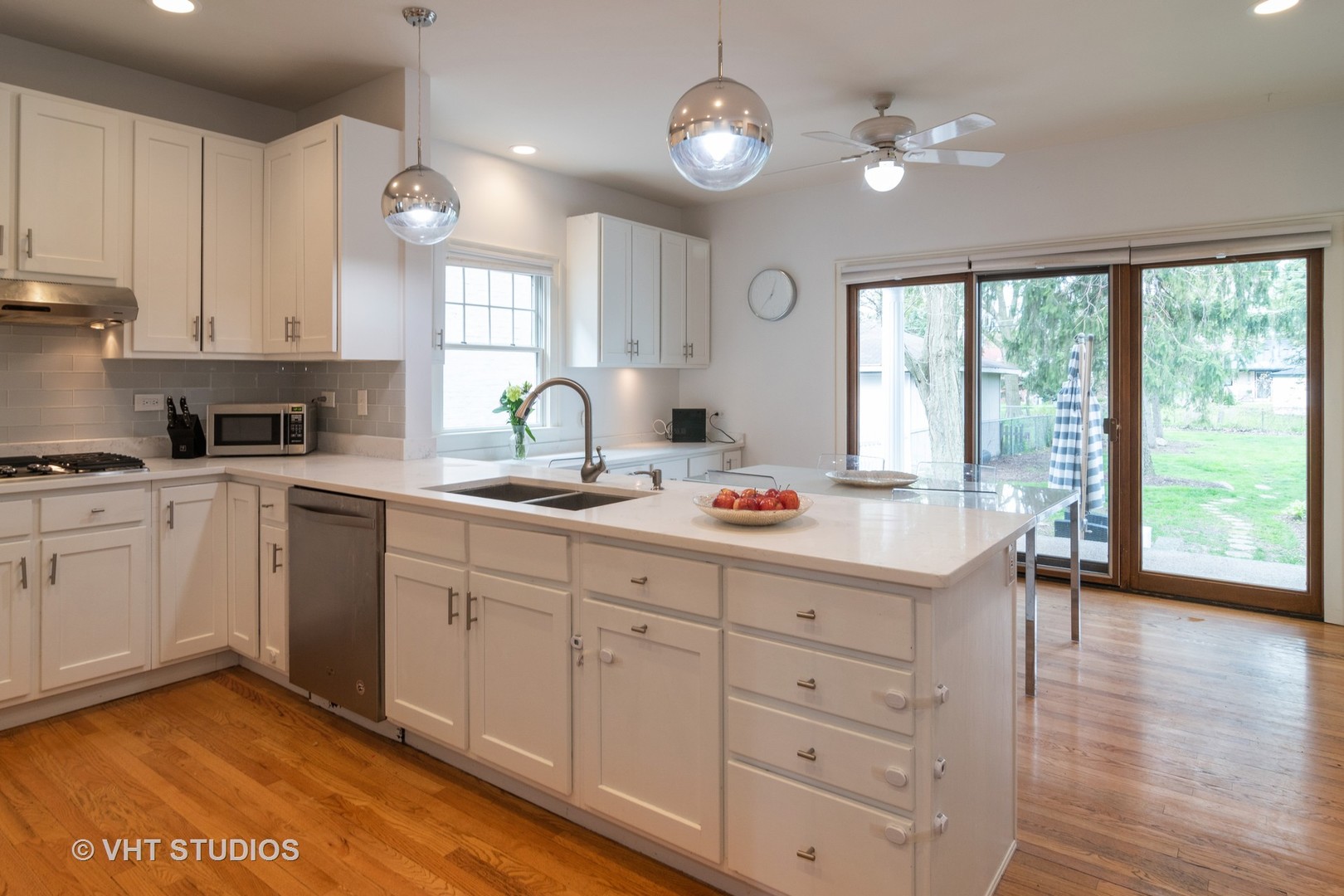 330 Northwood Road Riverside, IL 60546 - Photo 9 of 22 a kitchen with cabinets window and appliances