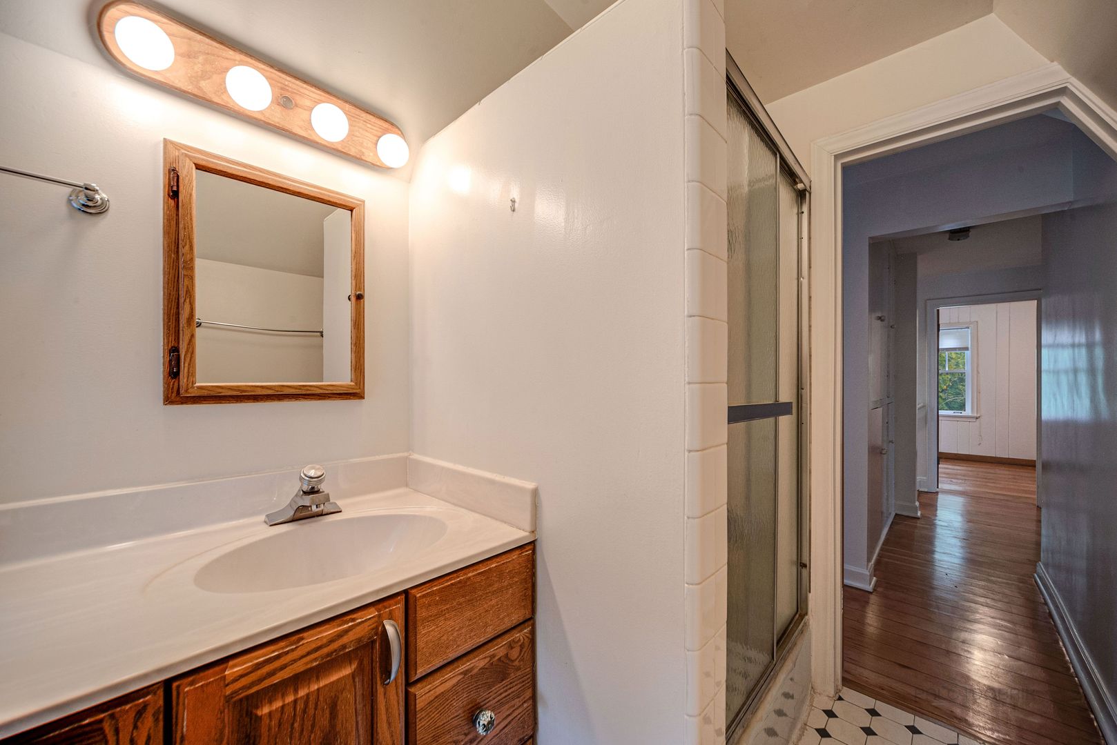 175 Wildwood Road Lake Forest, IL 60045 - Photo 19 of 28 a bathroom with a sink and a mirror