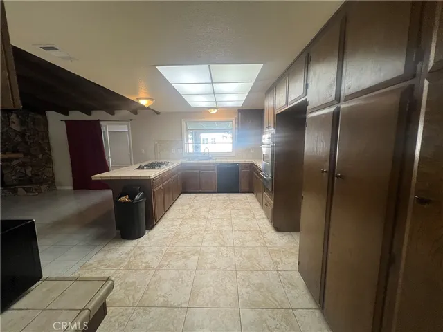 a lobby with furniture and window