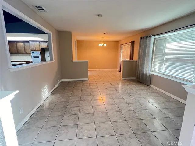 a view of a hallway with an empty room