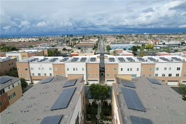a living room with furniture window and a flat screen tv