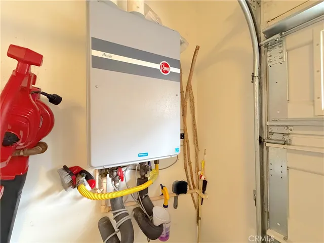 a large bedroom with a large bed and a large window