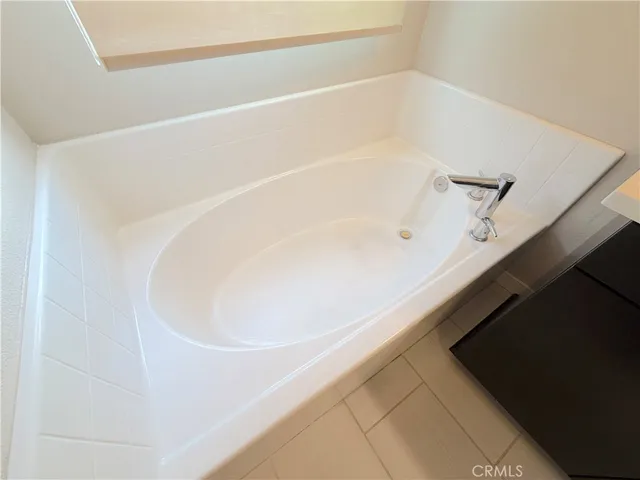 a kitchen with a sink a stove and a microwave oven