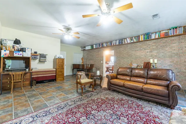 an outdoor view of house with backyard space