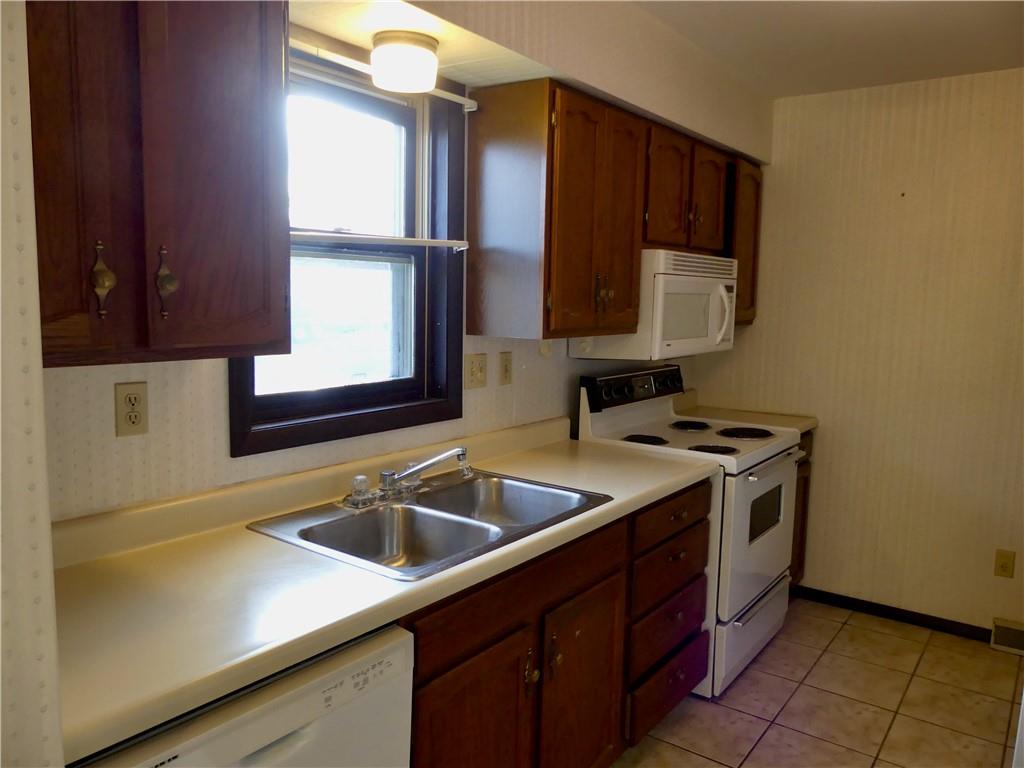 278 Kaufman Road Evans City, PA 16033 - Photo 6 of 22 The compact kitchen has everything you need!