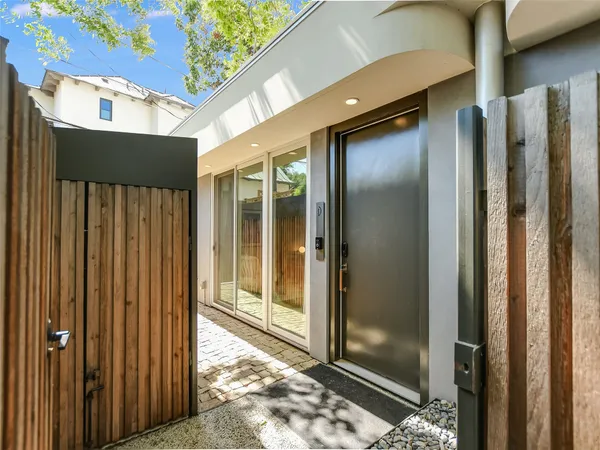 a view of a glass door and a window