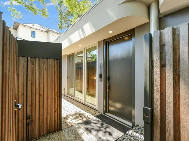 a view of a glass door and a window