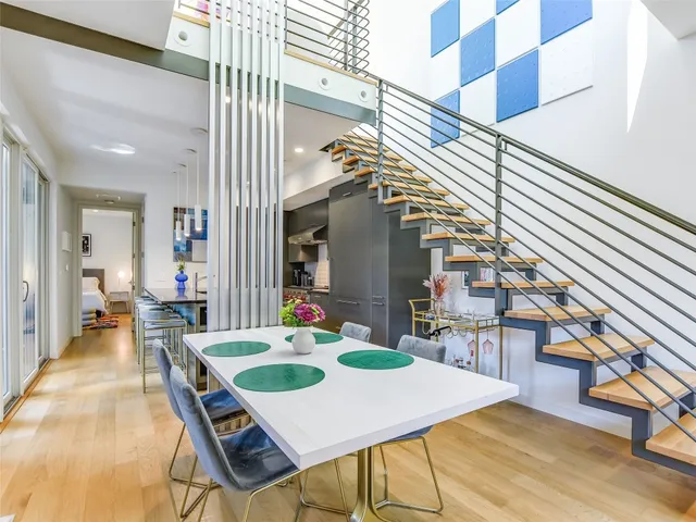 a dinning table and chairs in a patio