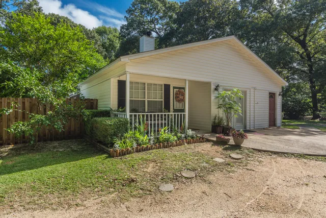 a view of a house with a garden