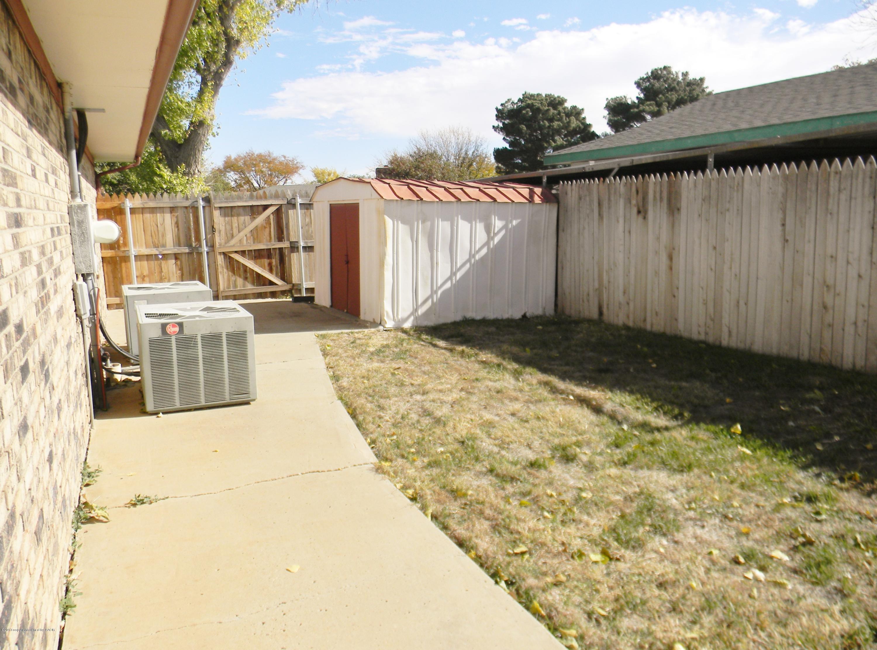 6700 Garwood Road Amarillo, TX 79109 - Photo 65 of 71 Side yard and shed