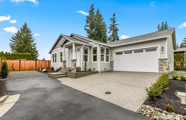 a front view of a house with patio