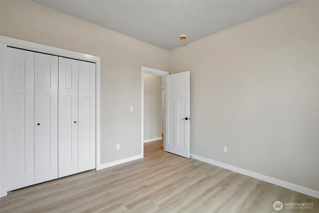 a kitchen with a stove and a microwave
