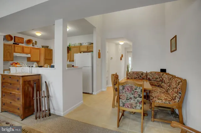 a living room with furniture fireplace and flat screen tv