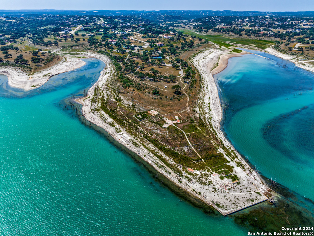 23375 North Cranes Mill Road Canyon Lake, TX 78070 - Photo 12 of 13 an aerial view of a residential houses with outdoor space and river