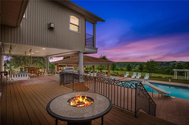 a view of a swimming pool with a patio