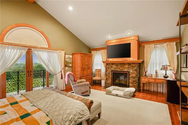 a bathroom with a granite countertop sink mirror vanity and a bathtub