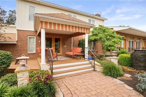 a view of a house with a patio