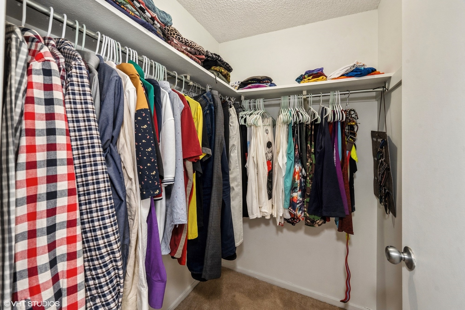 801 South Plymouth Court, Unit 809 Chicago, IL 60605 - Photo 7 of 10 a view of walk in closet with clothes and shoes