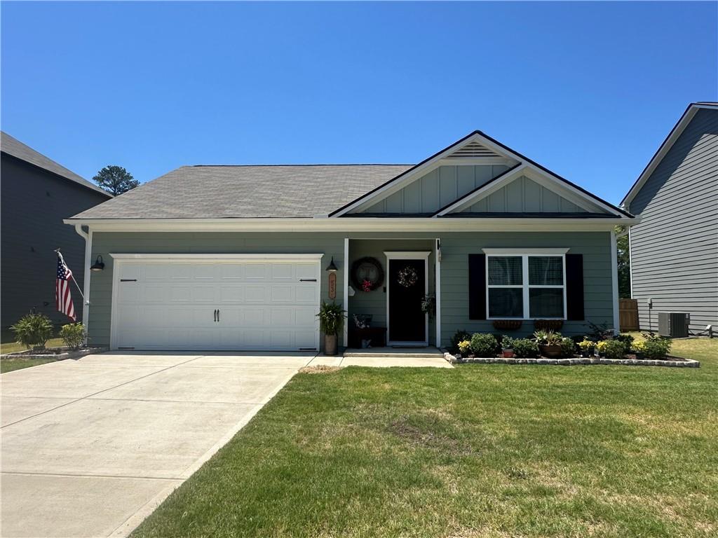 53 Bennett Way Rome, GA 30161 - Photo 28 of 42 a front view of a house with a garden and yard