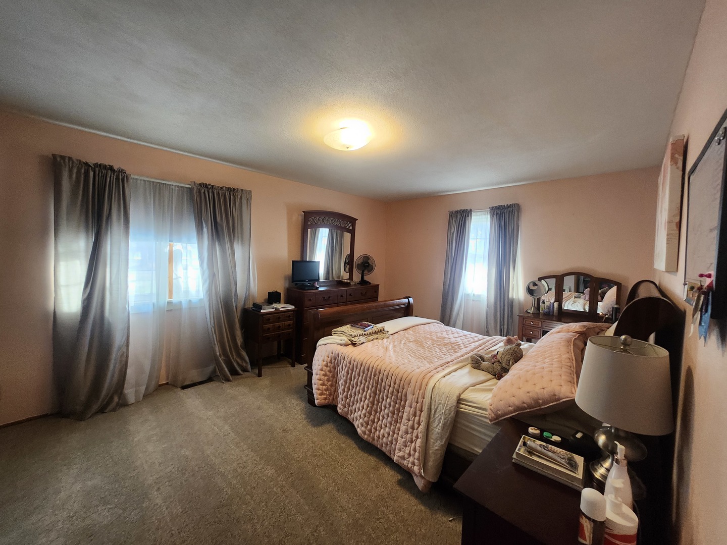 3649 Hamilton Park Road Pinckneyville, IL 62274 - Photo 14 of 24 a bedroom with a bed and dresser with chair