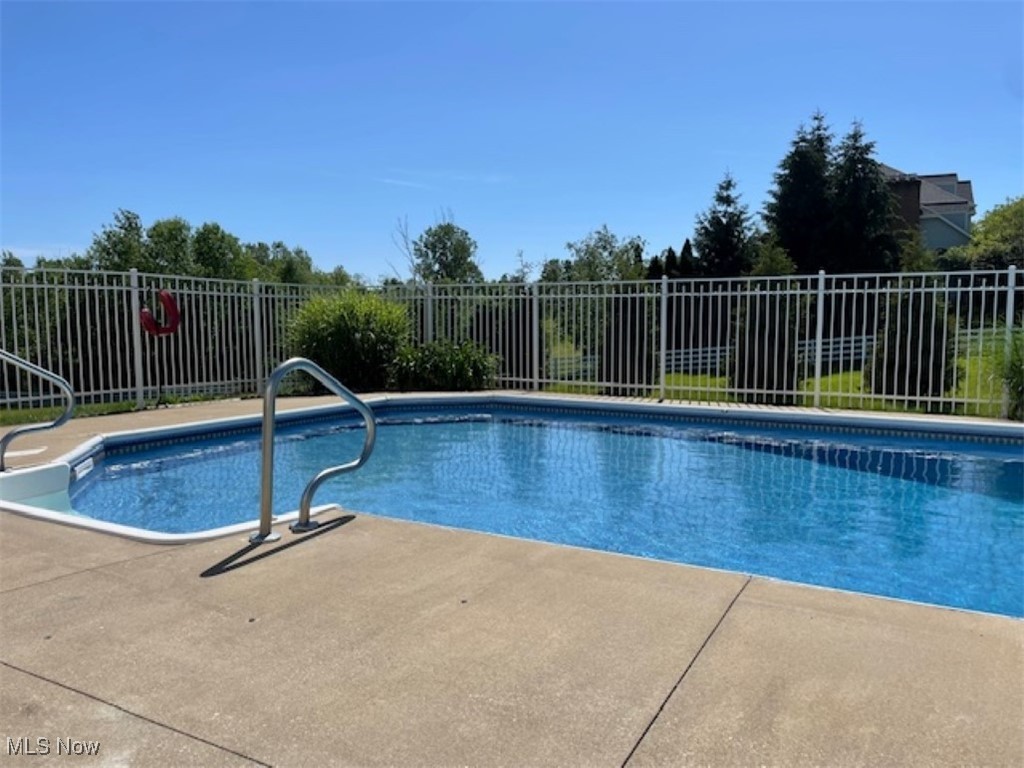 7300 Darrow Road Hudson, OH 44236 - Photo 37 of 44 View of swimming pool with a patio area
