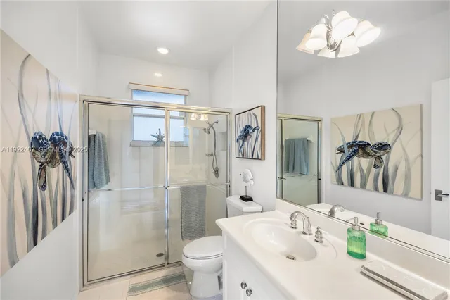 a bedroom with furniture and a flat screen tv