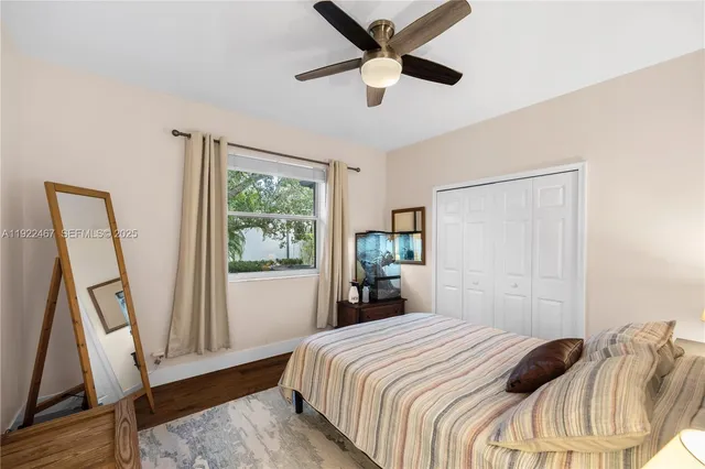 a large bathroom with a double vanity sink mirror and shower
