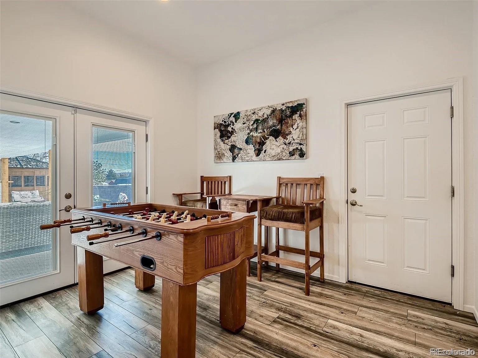 9910 Ammons Circle Westminster, CO 80021 - Photo 13 of 39 a view of a workspace with furniture and window
