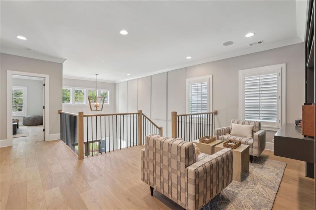 2591 Apple Valley Road Brookhaven, GA 30319 - Photo 19 of 31 a living room with furniture and windows