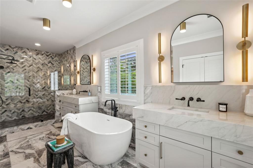 2591 Apple Valley Road Brookhaven, GA 30319 - Photo 22 of 31 a bathroom with a sink and a mirror