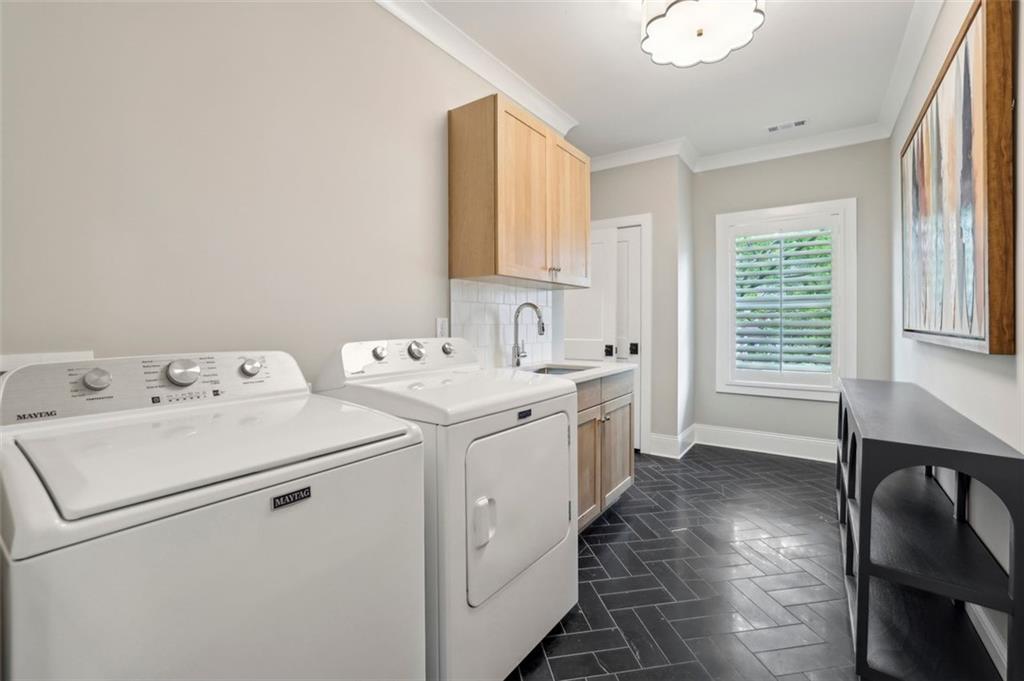 2591 Apple Valley Road Brookhaven, GA 30319 - Photo 24 of 31 a view of utility room with washer and dryer