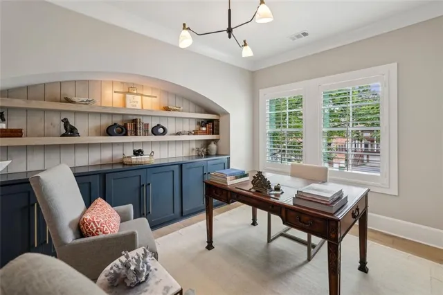 a bed room with a bed and a window