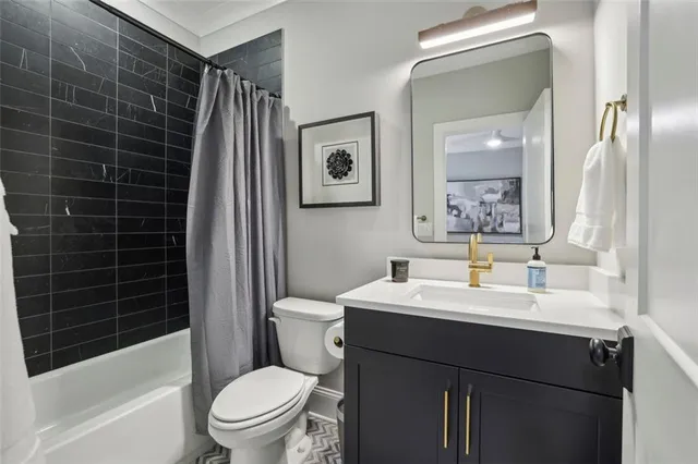 a bedroom with a bed and glass window