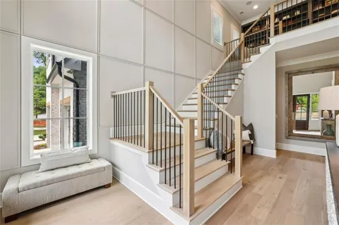 a view of livingroom with furniture and stairs