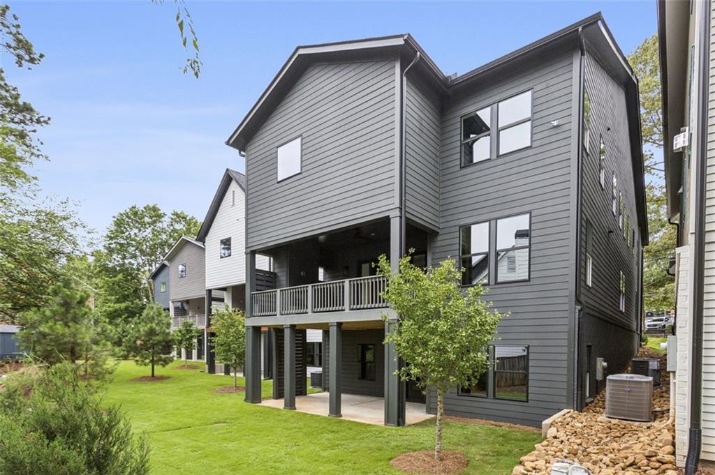 2591 Apple Valley Road Brookhaven, GA 30319 - Photo 31 of 31 a front view of a house with a yard