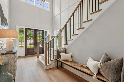 a view of a dining room with furniture and window