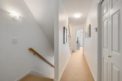 a view of a hallway with entryway