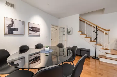 a workspace with furniture and rug