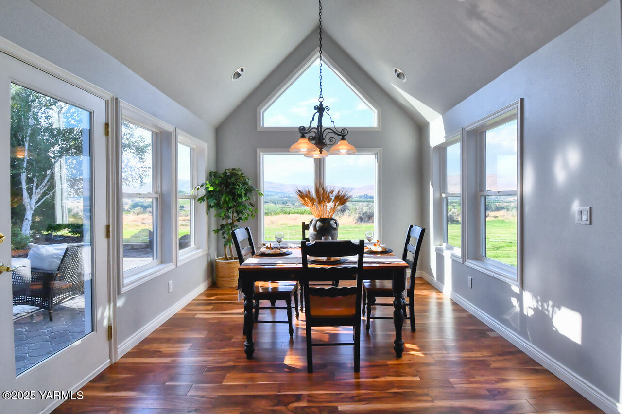 15783 Fisk Road Yakima, WA 98908 - Photo 14 of 61 a view of a dining room with furniture window and wooden floor