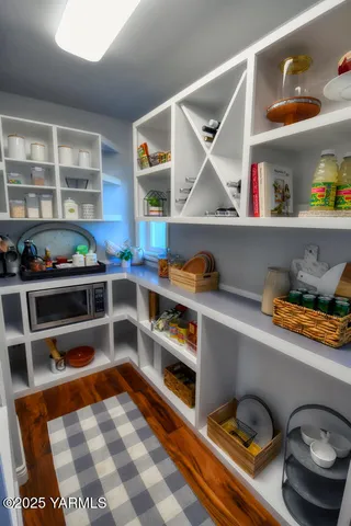 a outdoor living space with furniture and a potted plant