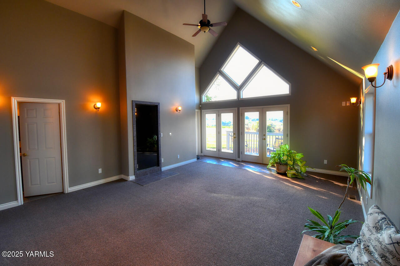 15783 Fisk Road Yakima, WA 98908 - Photo 44 of 61 wooden floor in an empty room with a window