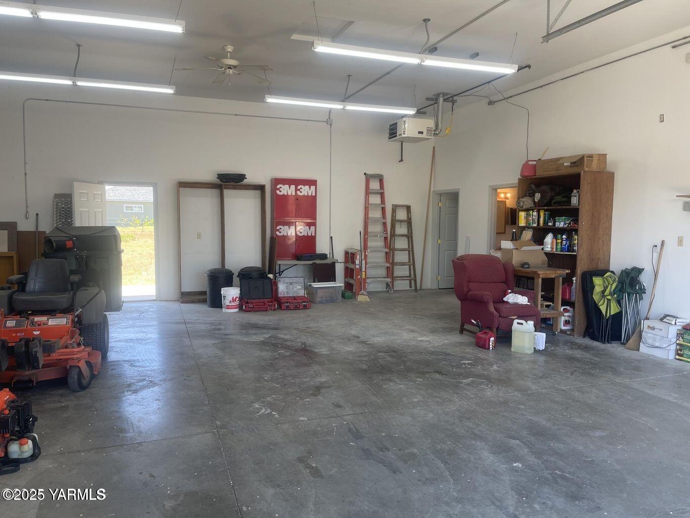 15783 Fisk Road Yakima, WA 98908 - Photo 55 of 61 a living room with furniture and a flat screen tv