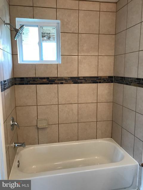 3901 Sadie Road Randallstown, MD 21133 - Photo 14 of 28 a bathroom with a bathtub
