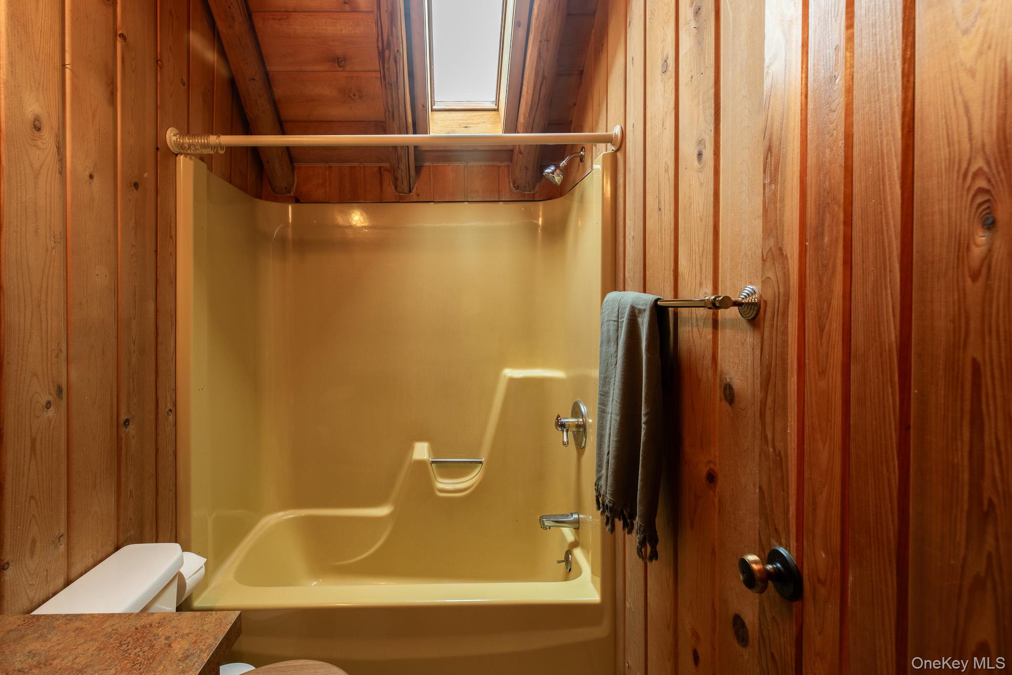 79 Torre Rock Road Red Hook, NY 12571 - Photo 29 of 33 Full bath featuring vanity, tub / shower combination, and wood ceiling