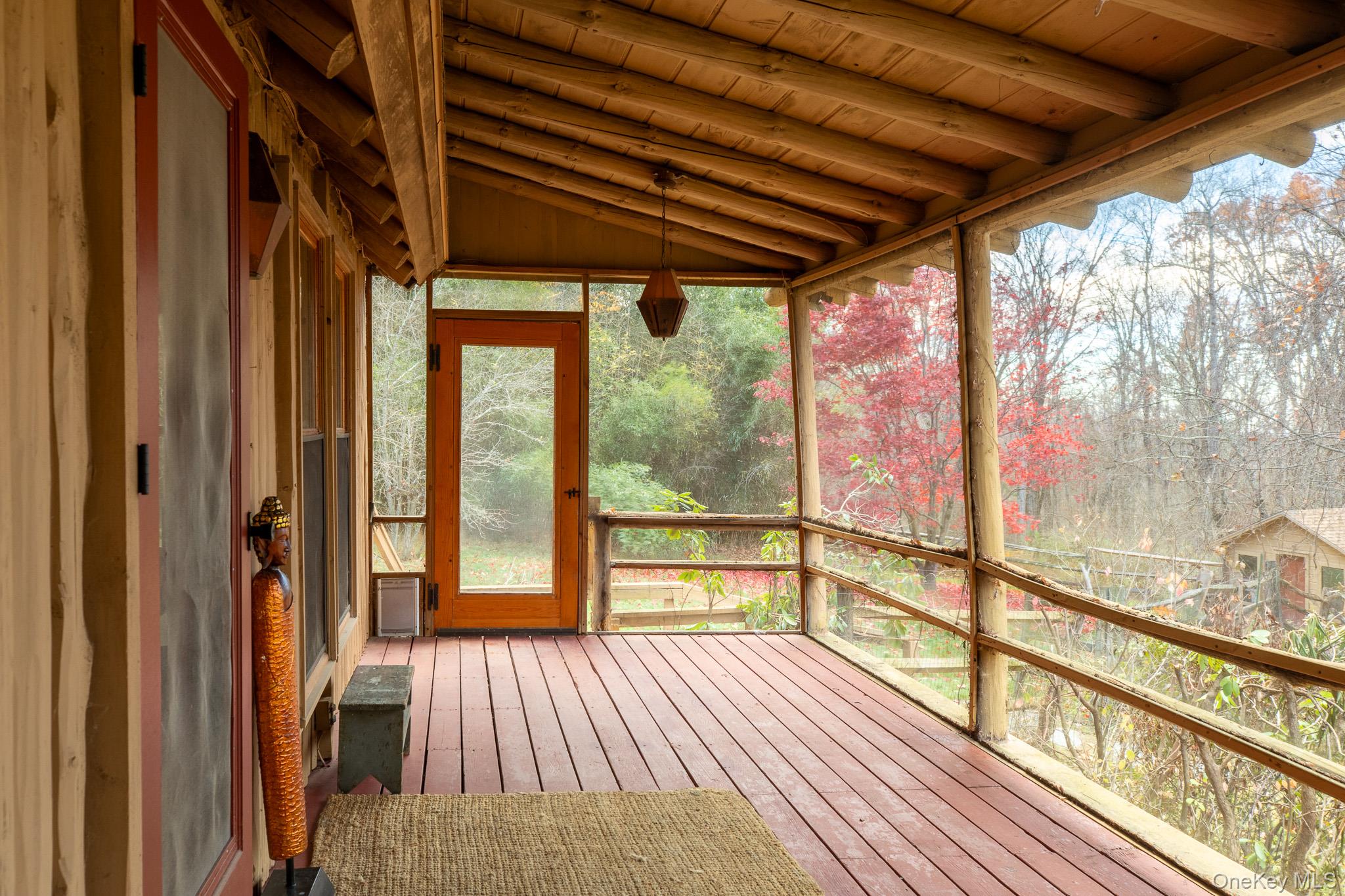 79 Torre Rock Road Red Hook, NY 12571 - Photo 4 of 33 Unfurnished sunroom with plenty of natural light, a wooden deck, and lofted ceiling