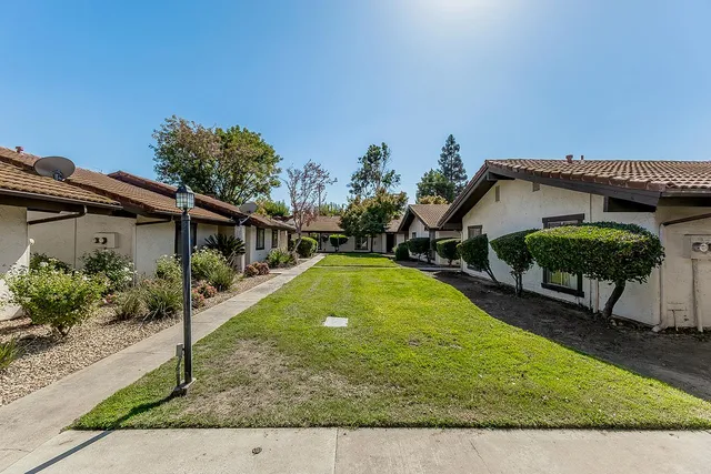 a view of a house with a swimming pool