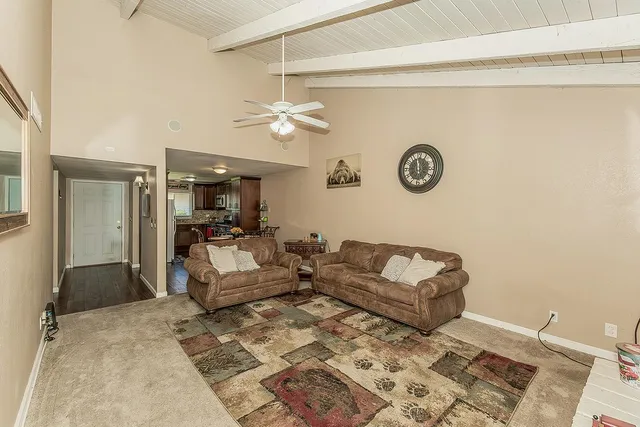 a living room with furniture and a window